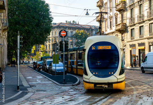 Leinwand Poster Modern tram on the streets of Milan. Italy.