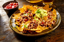 Cheese Nachos With Beef, Guacamole And Salsa