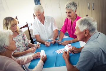 Wall Mural - group of seniors playing cards