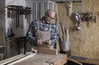 © fStop - Mature man working in carpenter shop