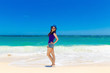 © frolova_elena - Young beautiful Asian girl on a tropical beach. Summer vacation