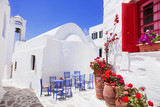 Fototapeta Uliczki - Traditional greek street with flowers in Amorgos island, Greece