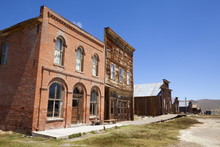 Brick Post Office And Dechambeau Hotel, Next To The Wooden IOOF Or Bodie Odd Fellows Lodge, A Masonic Lodge Dating From 1878, On Main Street In The Gold Mining Ghost Town Of Bodie, Bodie State Historic Park, Bridgeport, California, United States Of Americ