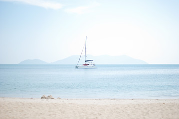  white sailboat in the sea and hot summer sunny day