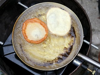 sweet pastry frying in hot oil