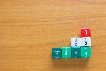 color fraction dices on wood table