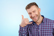 © fotofabrika - young  man showing call me