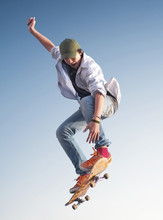 Skater On The Sky Background. Sport And Active Life Concept