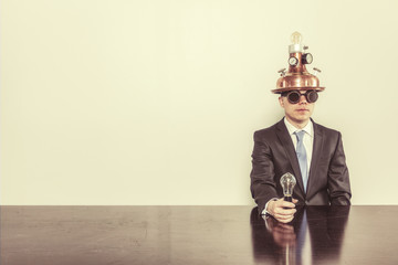 Vintage businessman sitting at office desk