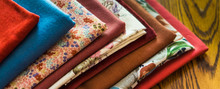 stash of fabrics for fall sewing projects 
