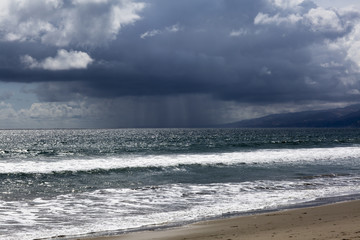  Pacific ocean during a storm. Beach landscape in the U.S. in bad weather. The ocean and waves during strong winds in United States, Santa Monica.