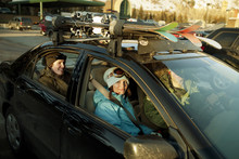 Friends Traveling In Car For Skiing Trip