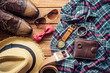 Accessories and apparel for men on a wooden floor - life style