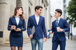 © leungchopan - Group of business people walking at outdoor