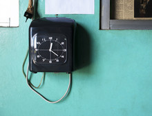 Phone With Clock On Wall