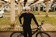 © shevtsovy - bicycle style man in black sportswear