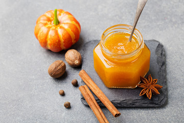 Wall Mural - Pumpkin confiture, jam, sauce with spices on stone table