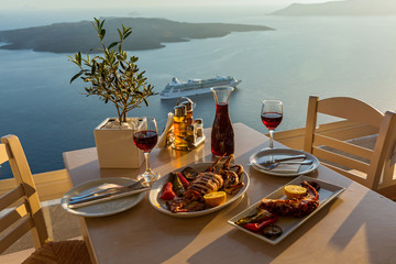 Dinner with seafood and red wine