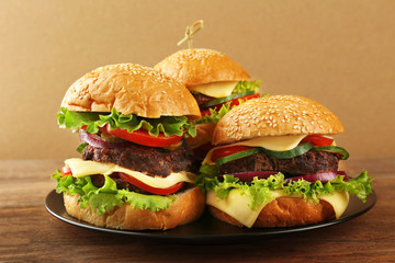 Canvas Print - Double hamburgers on wooden table