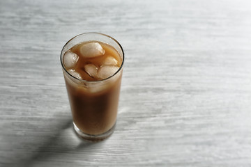 Poster - Cold coffee on wooden table