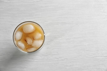 Poster - Cold coffee on wooden table