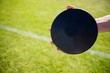 © WavebreakMediaMicro - Close-up of hand holding a discus