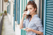 © ZoomTeam - Woman drinking coffee at terrace on a morning