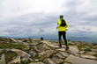 © aboutfoto - Trail running man on mountain path