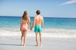 © WavebreakMediaMicro - Couple standing on beach
