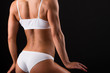 © mintybear - Beautiful sporty woman body. Isolated on black background