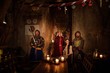© Nejron Photo - Medieval queen with her courtier and knights on guard in ancient castle interior.