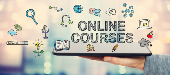 online courses concept with man holding tablet