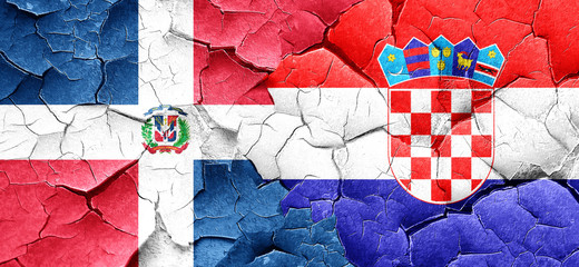 dominican republic flag with Croatia flag on a grunge cracked wa