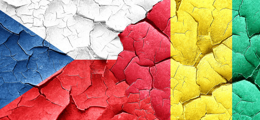 czechoslovakia flag with Guinea flag on a grunge cracked wall