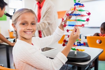 Poster - Cute pupil building an atom