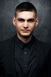 © cherry_d - Portrait of handsome man in a black suit.