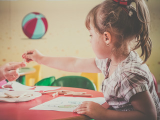 Little girl coloring