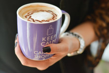 One Big Cup Of Cappuccino, White Milk Coffee Held In Hand: Keep Calm And Carry On Shopping Concept