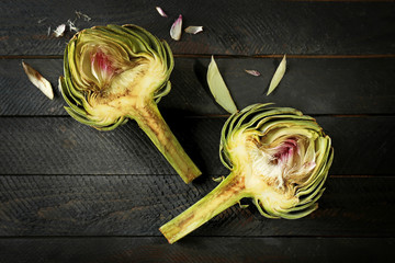 Artichokes on wooden background