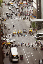 High Angle View Of People Crossing City Street