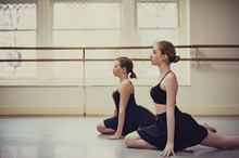 Dancers Practicing Ballet At Dance Studio