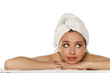 © vladimirfloyd - beautiful young dissatisfied woman with a towel on her head