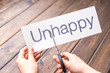 unhappy to happy on paper by scissors