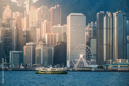 Fotografia Hong Kong's Victoria Harbour in sunrise..