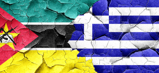 Mozambique flag with Greece flag on a grunge cracked wall