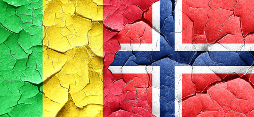 Mali flag with Norway flag on a grunge cracked wall