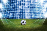 Fototapeta Sport - Soccer ball on the field