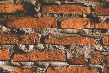 Red old worn brick wall texture background. Vintage effect.