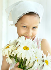 Wall Mural - little girl with dasies flowers