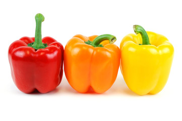 colorful bell peppers isolated on white background